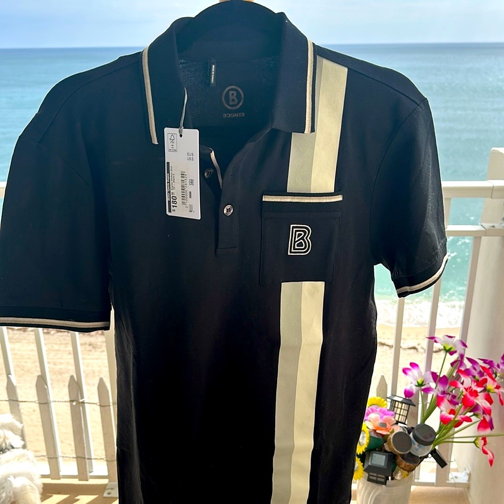 NWT UNISEX Bogner Black Polo Shirt with White Accents and side top pocket.